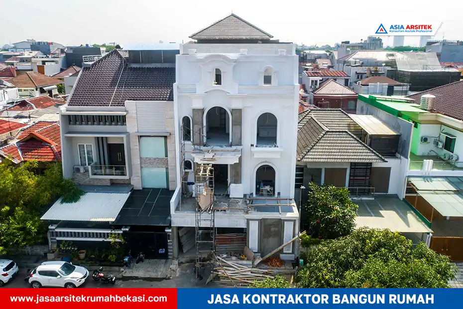 Rumah tropis mewah 3 lantai dengan fasad putih dan atap limasan karya Asia Arsitek - Jasa Kontraktor Bangunan di Bekasi Selatan